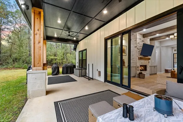 a view of a yard with chairs