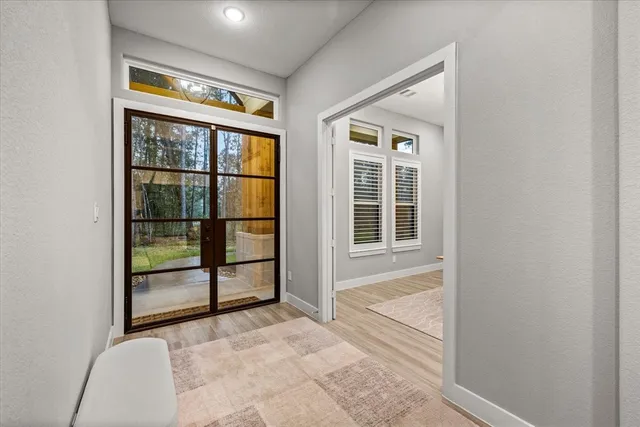 a workspace with furniture and wooden floor