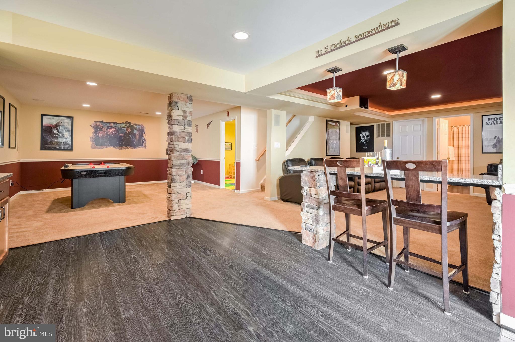 14004 Richter Farm Road Boyds, MD 20841 - Photo 29 of 50 Lower Level with accent stone & Pergo flooring