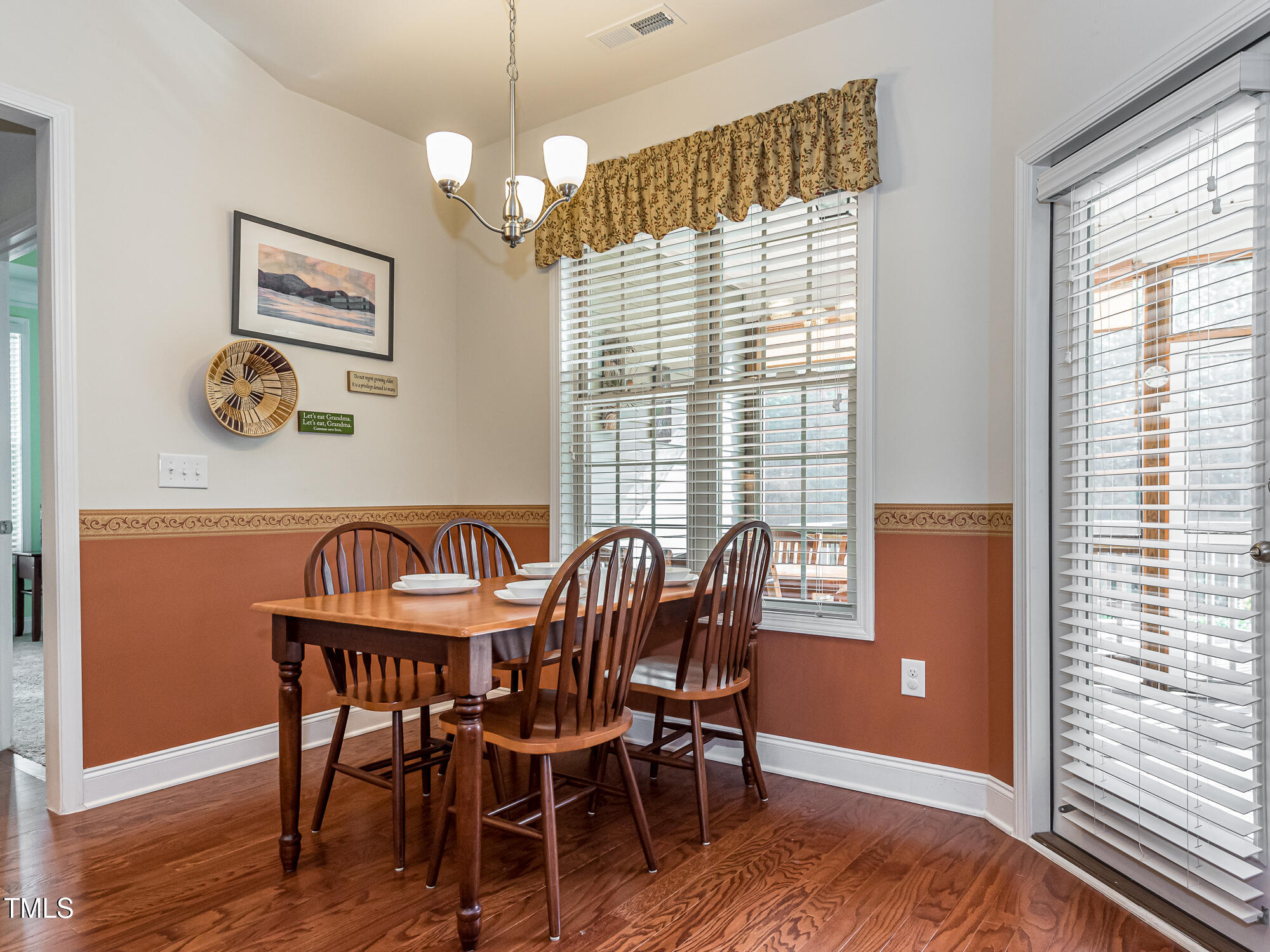 7512 Channery Way Raleigh, NC 27616 - Photo 14 of 45 a dining room with furniture and window