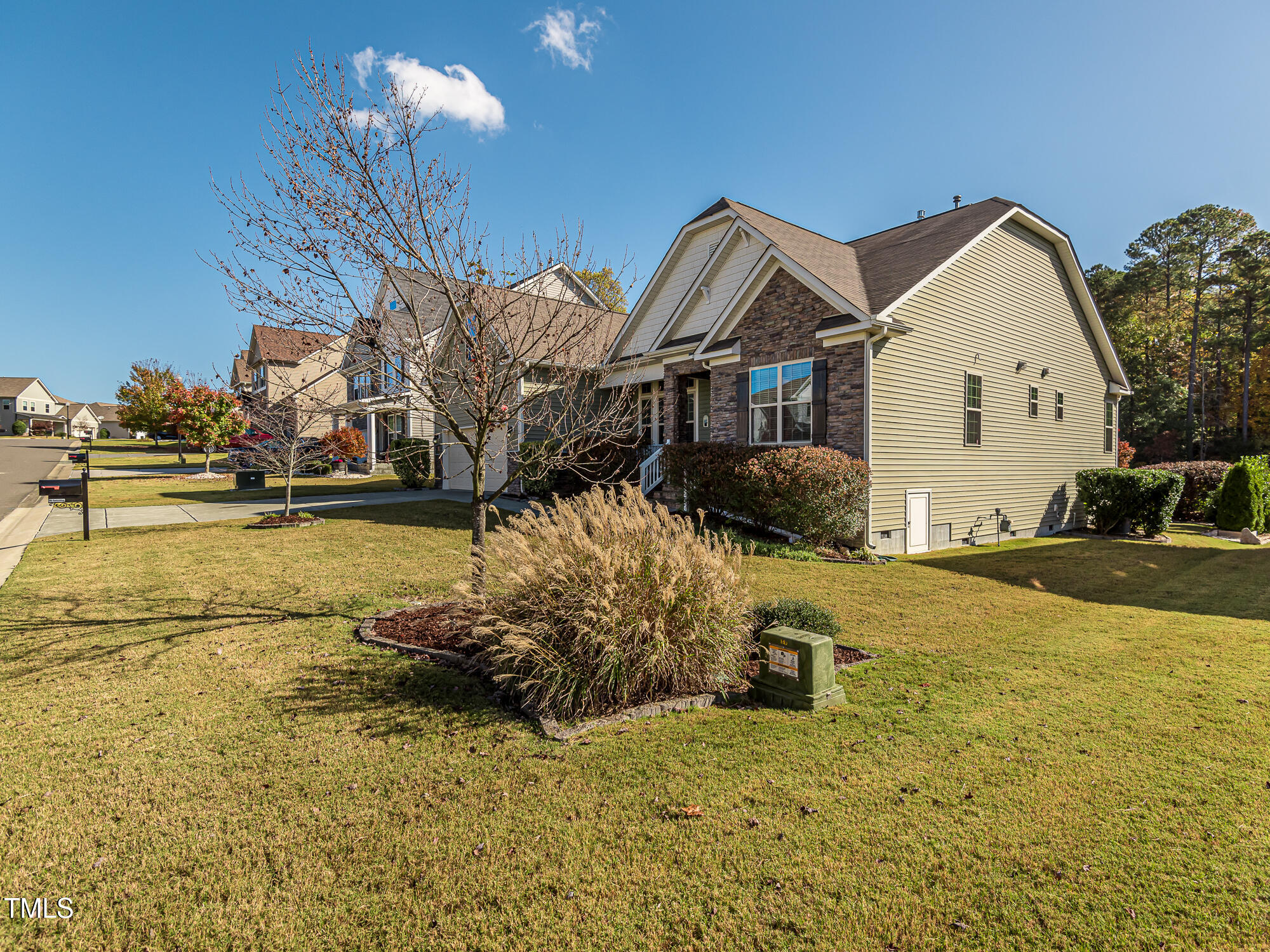7512 Channery Way Raleigh, NC 27616 - Photo 2 of 45 a front view of a house with a yard