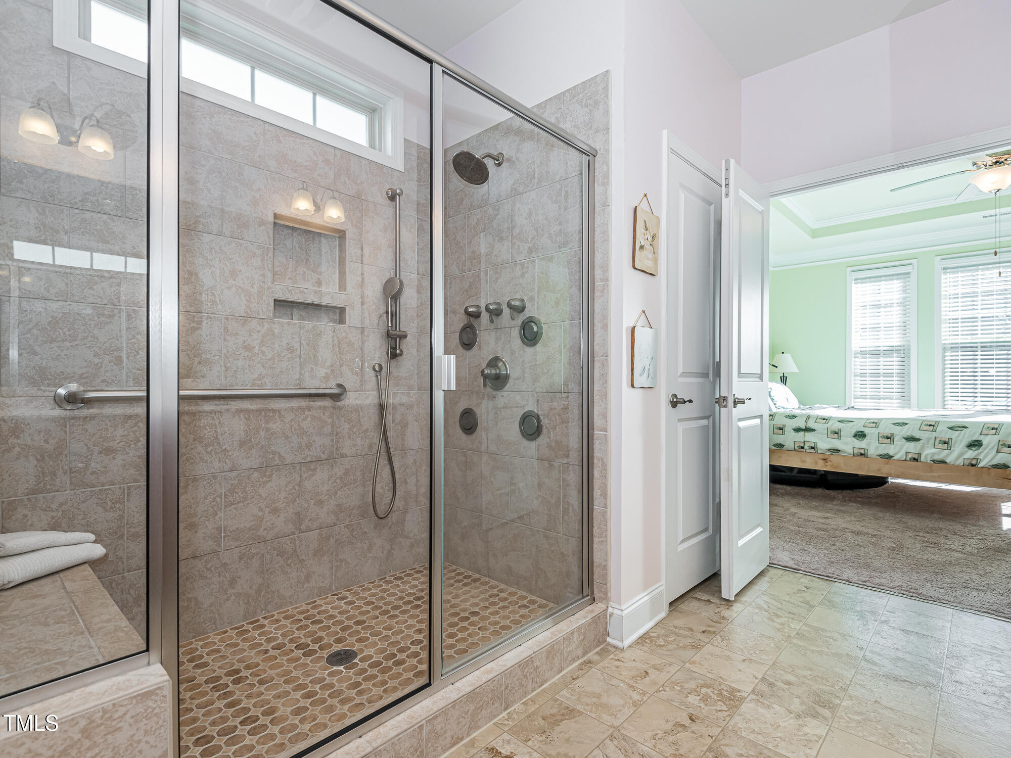7512 Channery Way Raleigh, NC 27616 - Photo 21 of 45 a bathroom with a shower and a sink