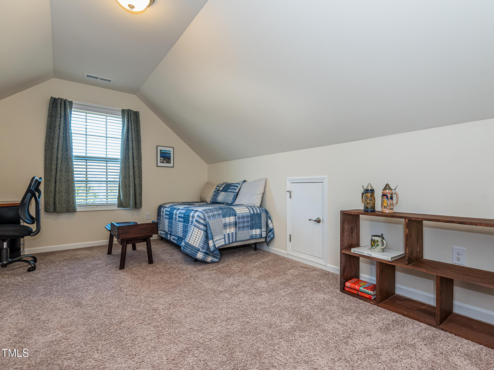 7512 Channery Way Raleigh, NC 27616 - Photo 27 of 45 a living room with furniture and a window