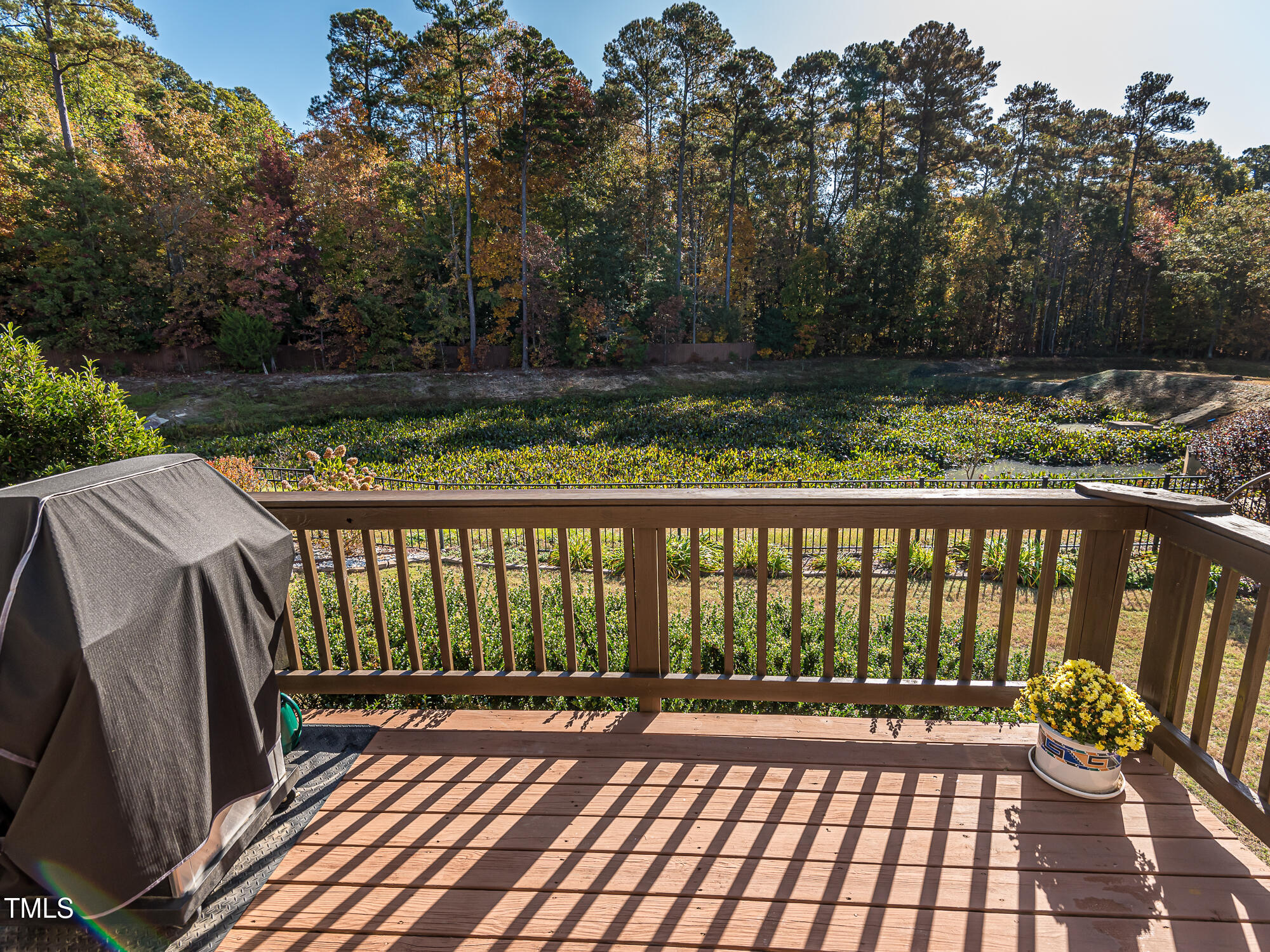 7512 Channery Way Raleigh, NC 27616 - Photo 36 of 45 a view of balcony with wooden floor and fence