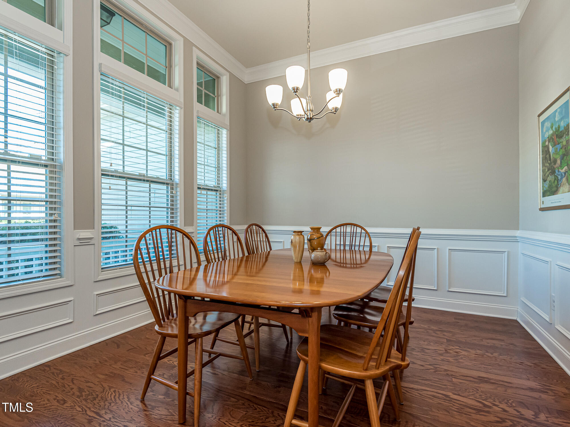7512 Channery Way Raleigh, NC 27616 - Photo 7 of 45 a view of a dining room with furniture window and wooden floor