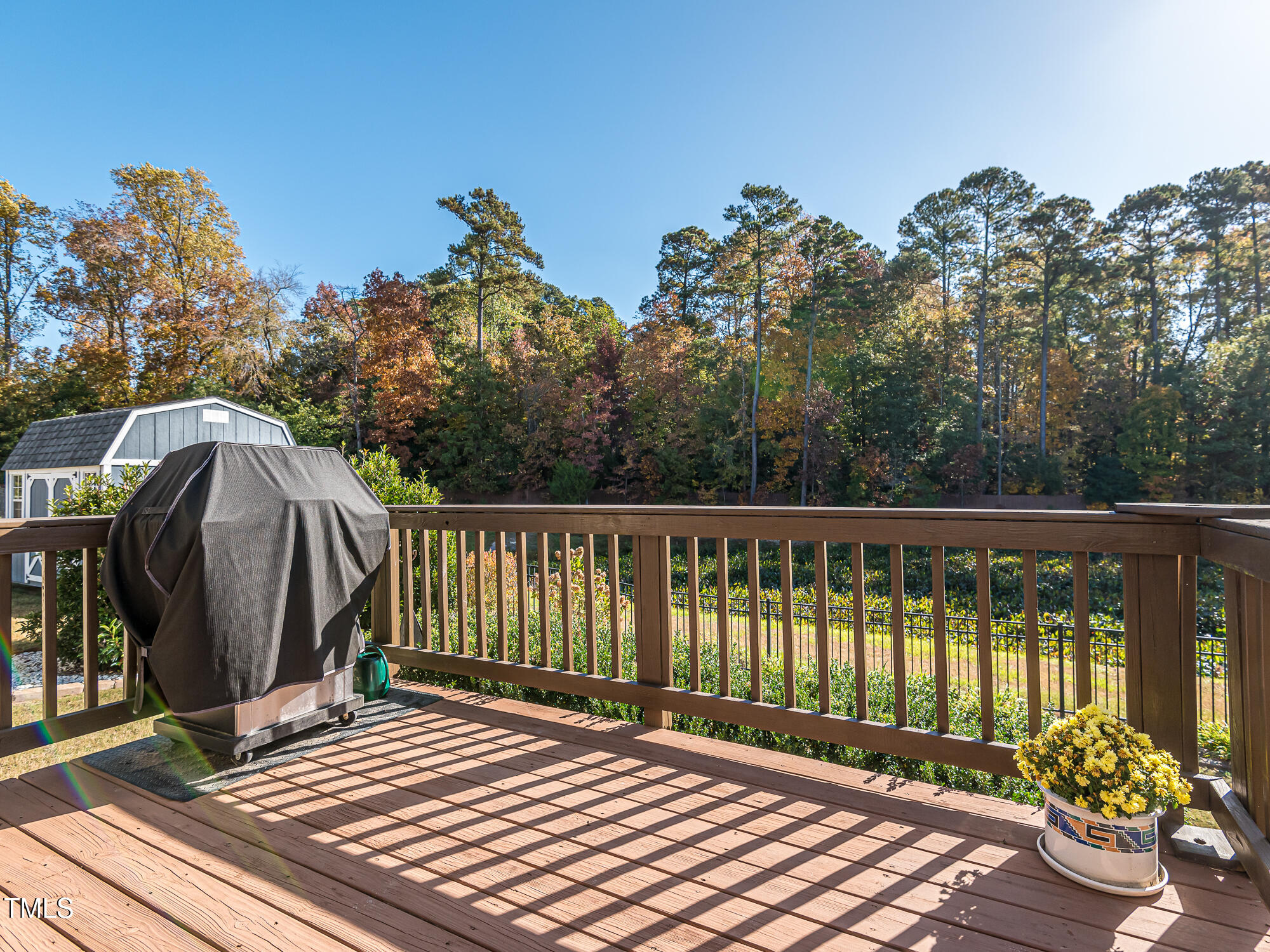 7512 Channery Way Raleigh, NC 27616 - Photo 9 of 45 a view of a wooden roof deck