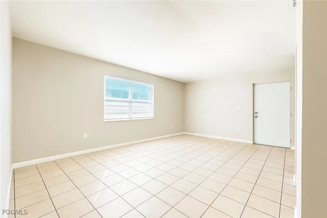 a view of an empty room and window