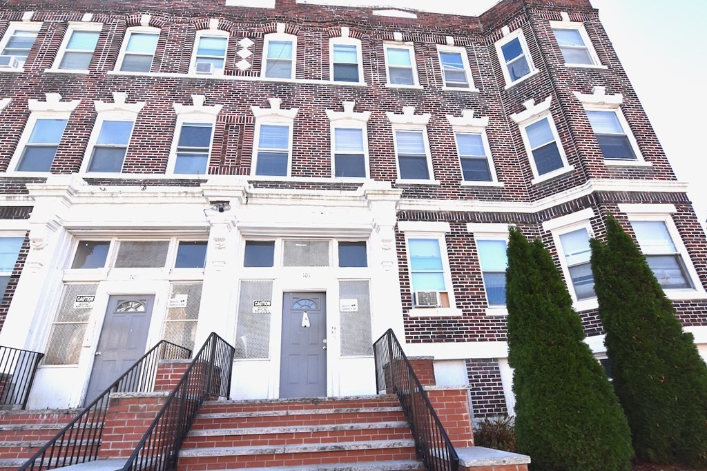 105 Homestead Street, Unit 2 Boston, MA 02121 - Photo 7 of 19 a front view of a multi story residential apartment building