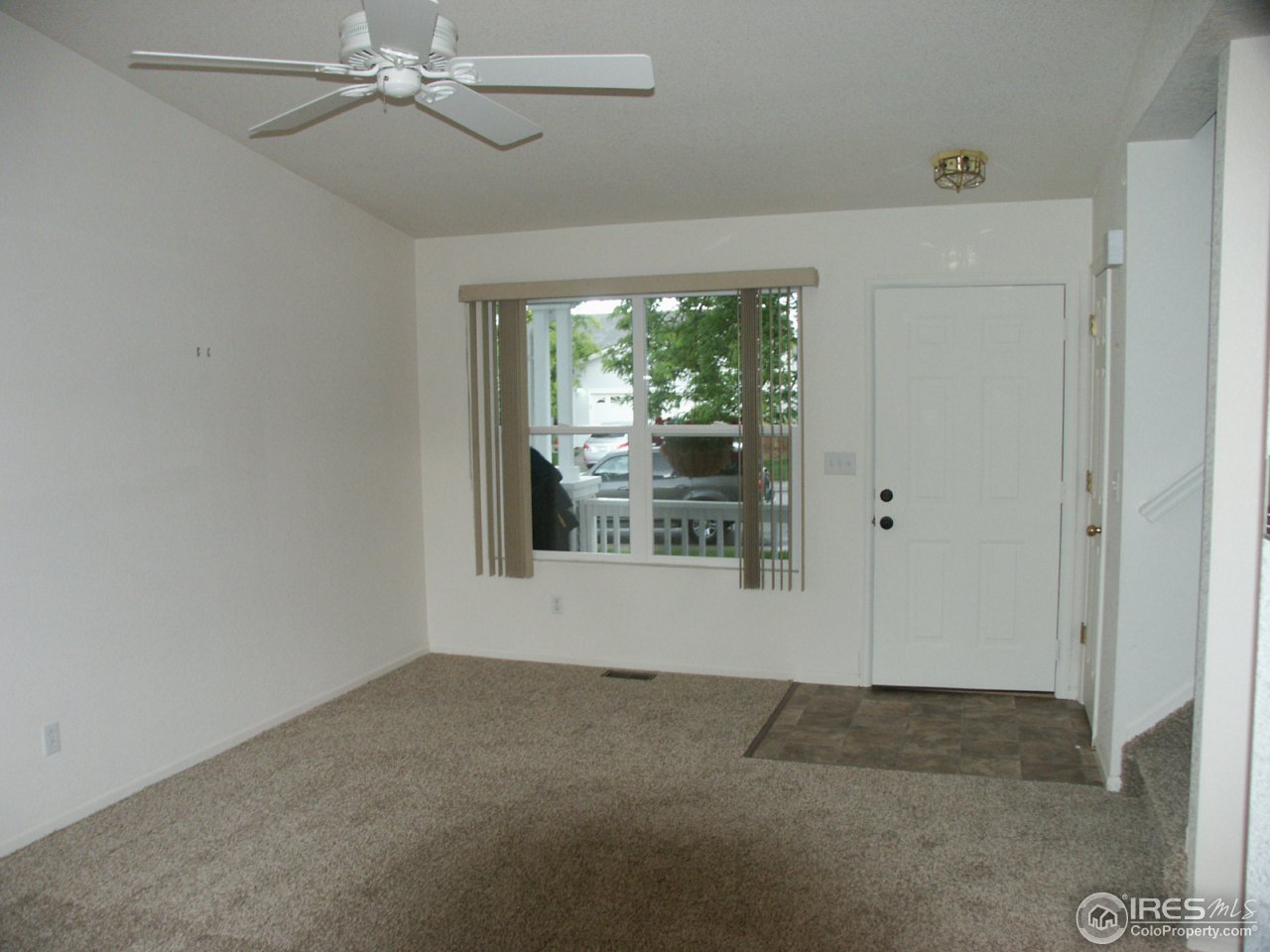 1338 Trail Ridge Road Longmont, CO 80504 - Photo 8 of 13 a view of an empty room with windows