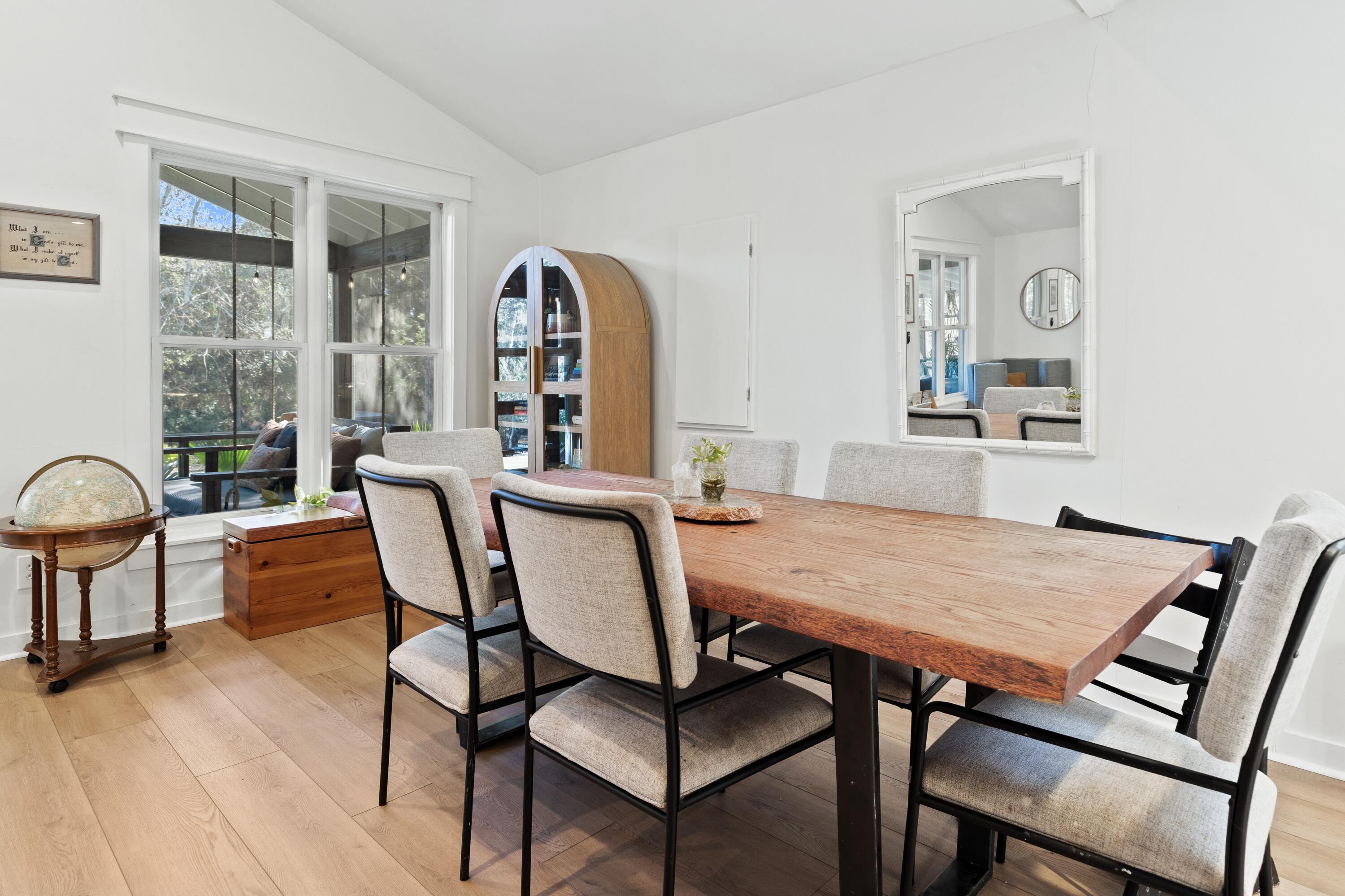 59 Chelsey Lane Santa Rosa Beach, FL 32459 - Photo 12 of 41 a view of a dining room with furniture window and wooden floor