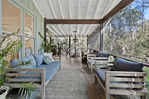 a view of outdoor space with wooden staircase