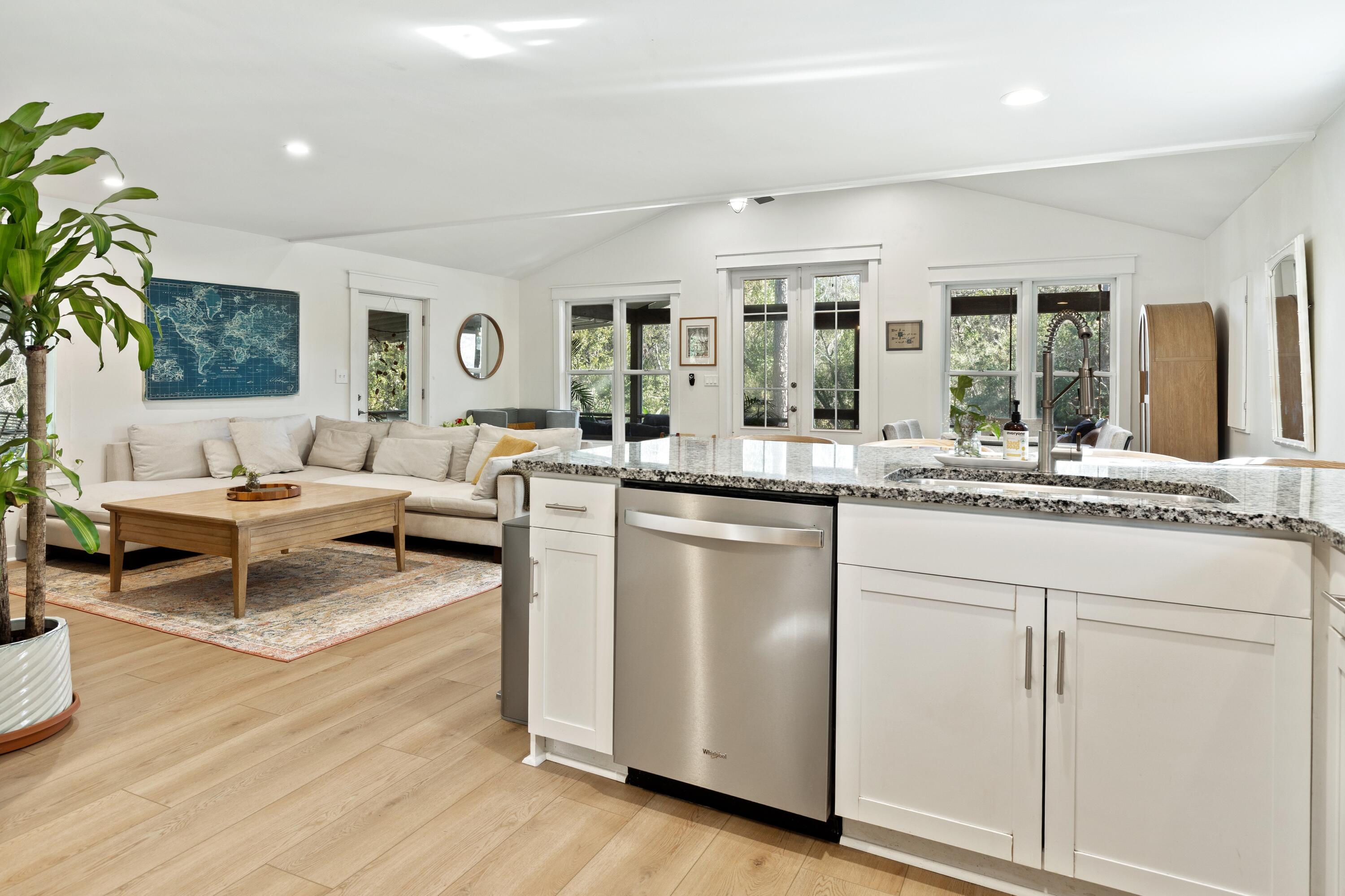 59 Chelsey Lane Santa Rosa Beach, FL 32459 - Photo 4 of 41 a living room with kitchen island furniture and a large window