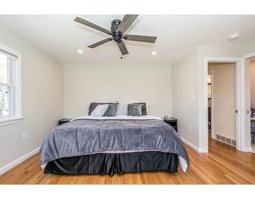 60 South Shore Road Holbrook, MA 02343 - Photo 8 of 20 a bedroom with a bed and wooden floor