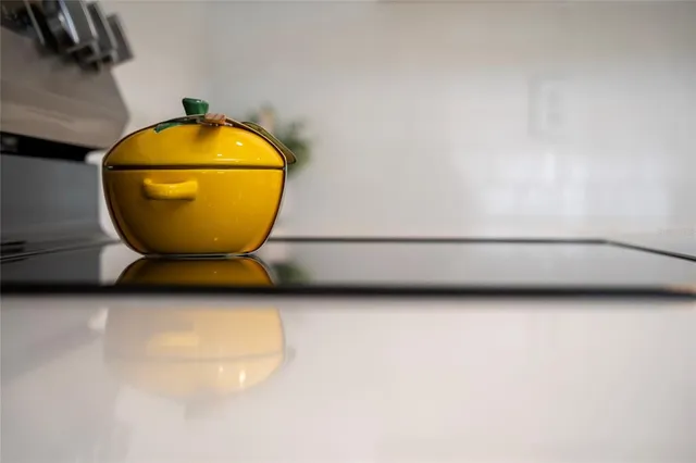 a kitchen with a sink and a microwave