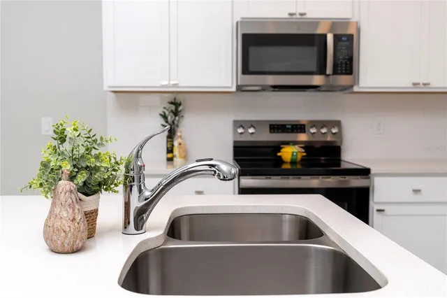 a vase of flowers sitting on a table
