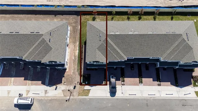 a view of building with outdoor space and river