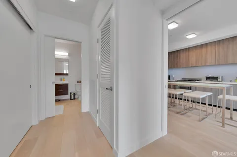 a view of a kitchen from the hallway