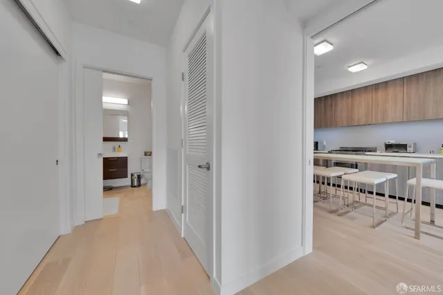 a view of a kitchen from the hallway