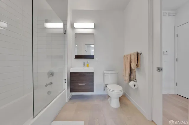 a bathroom with a toilet sink and a bathtub