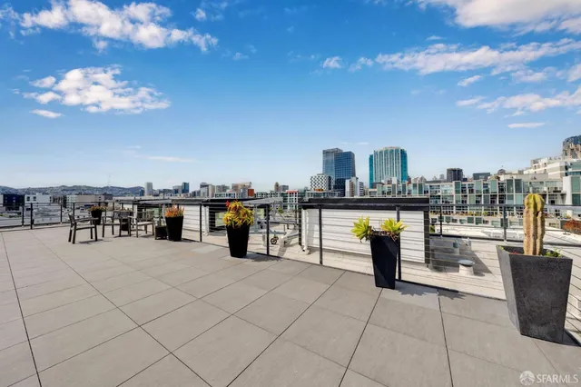 a view of a terrace with chairs