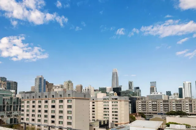 a view of a city with tall buildings