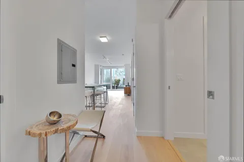 a view of a livingroom with furniture and wooden floor