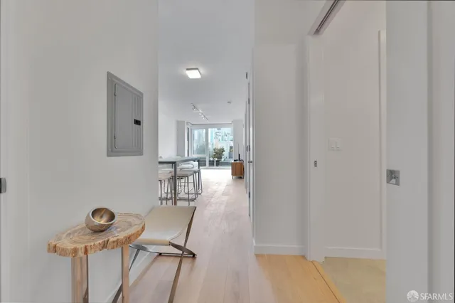 a view of a livingroom with furniture and wooden floor