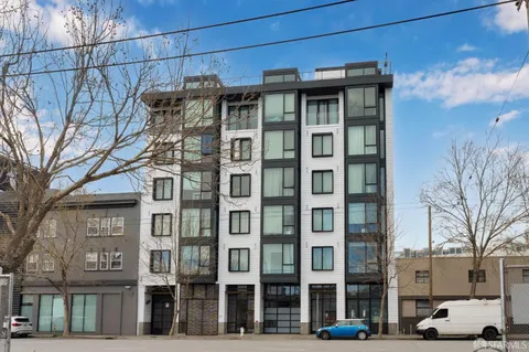 a view of a building with a street