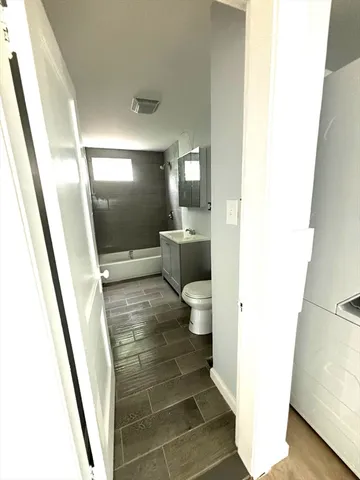 a bathroom with a sink and a toilet