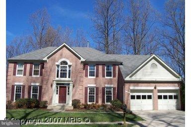 1321 Atwood Road Silver Spring, MD 20906 - Photo 1 of 1 a front view of a house with a yard