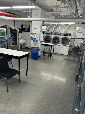 a backyard of a house with outdoor seating