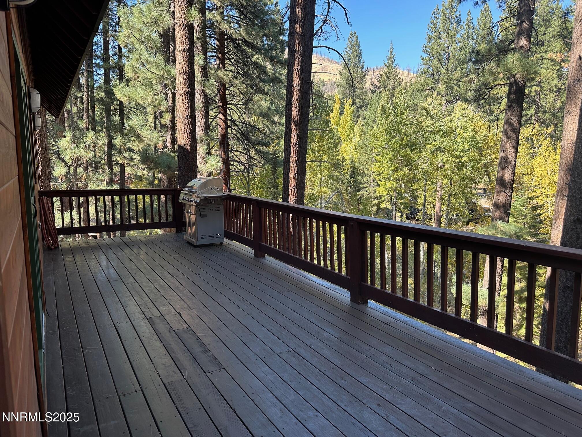 100 Timber Lane Markleeville, CA 96120 - Photo 2 of 29 a view of balcony with wooden floor