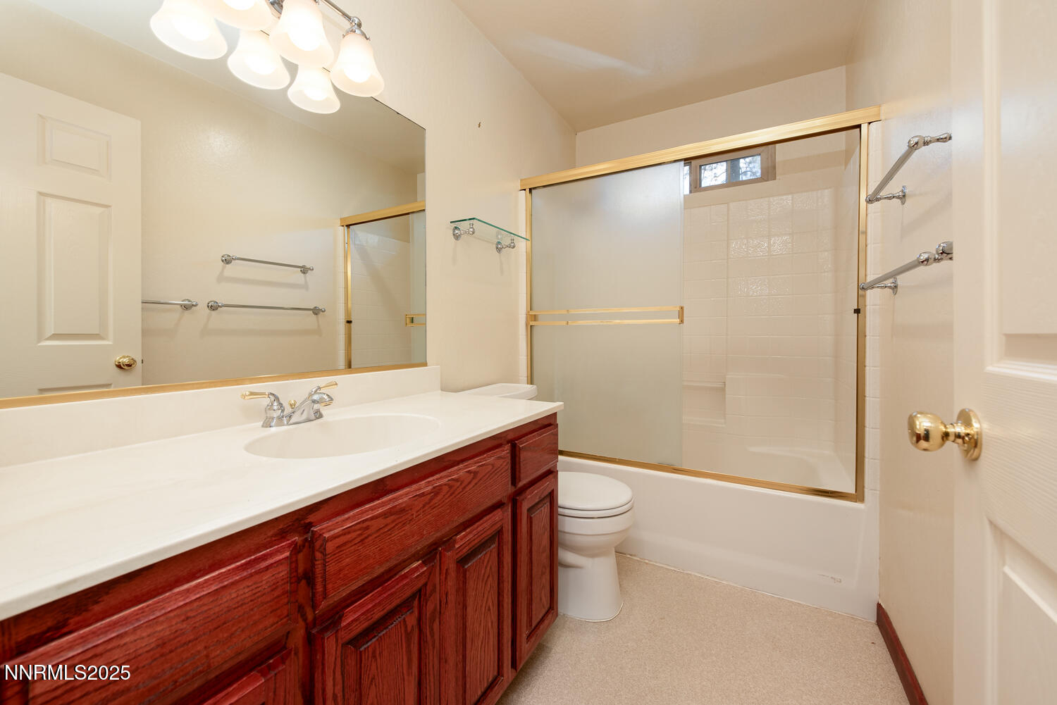 100 Timber Lane Markleeville, CA 96120 - Photo 21 of 29 a bathroom with a sink a toilet a mirror and shower