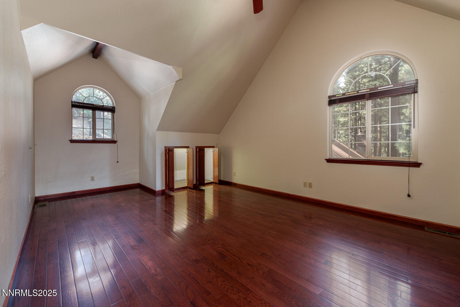 100 Timber Lane Markleeville, CA 96120 - Photo 24 of 29 a view of an empty room with wooden floor and a window