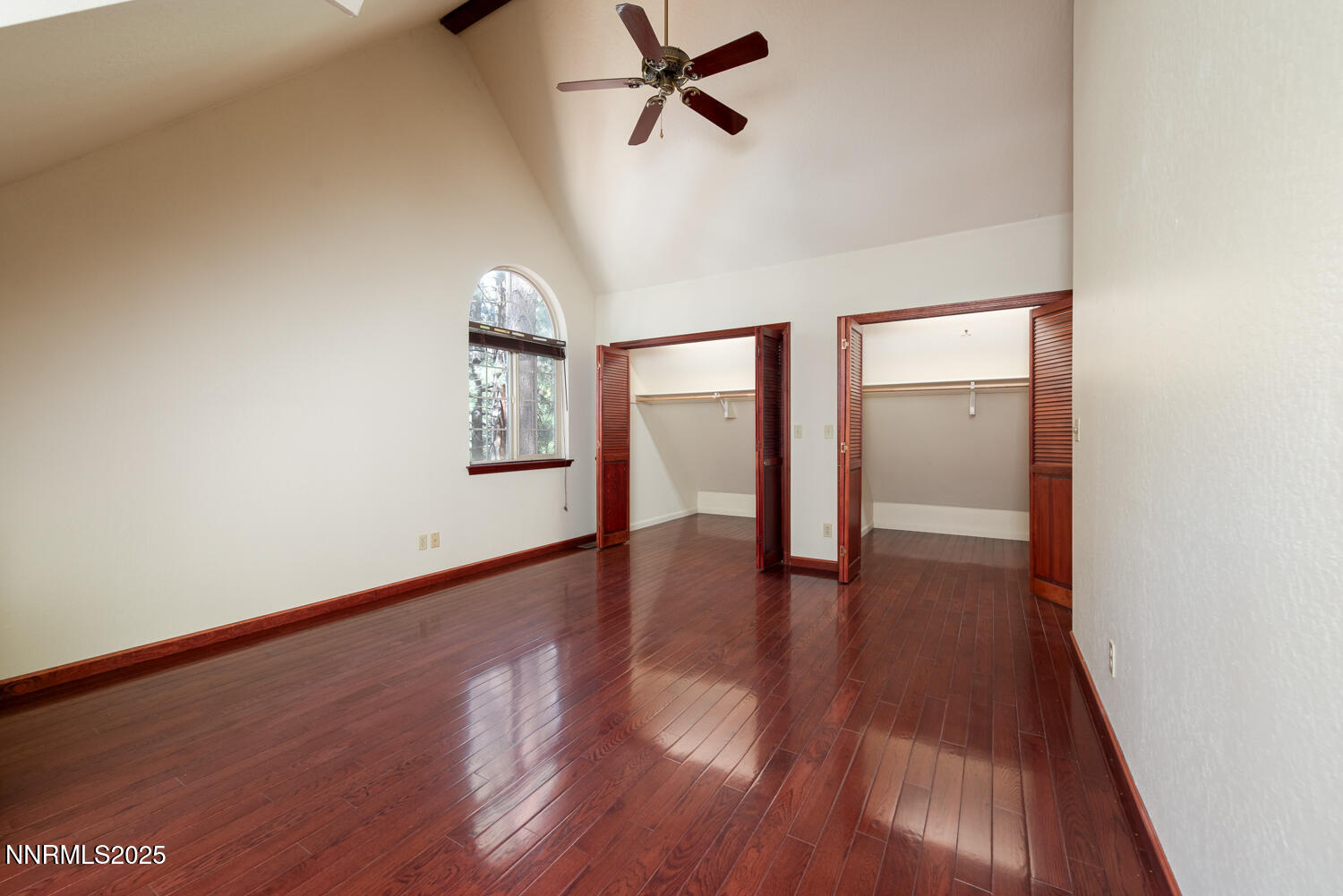 100 Timber Lane Markleeville, CA 96120 - Photo 27 of 29 an empty room with wooden floor and windows