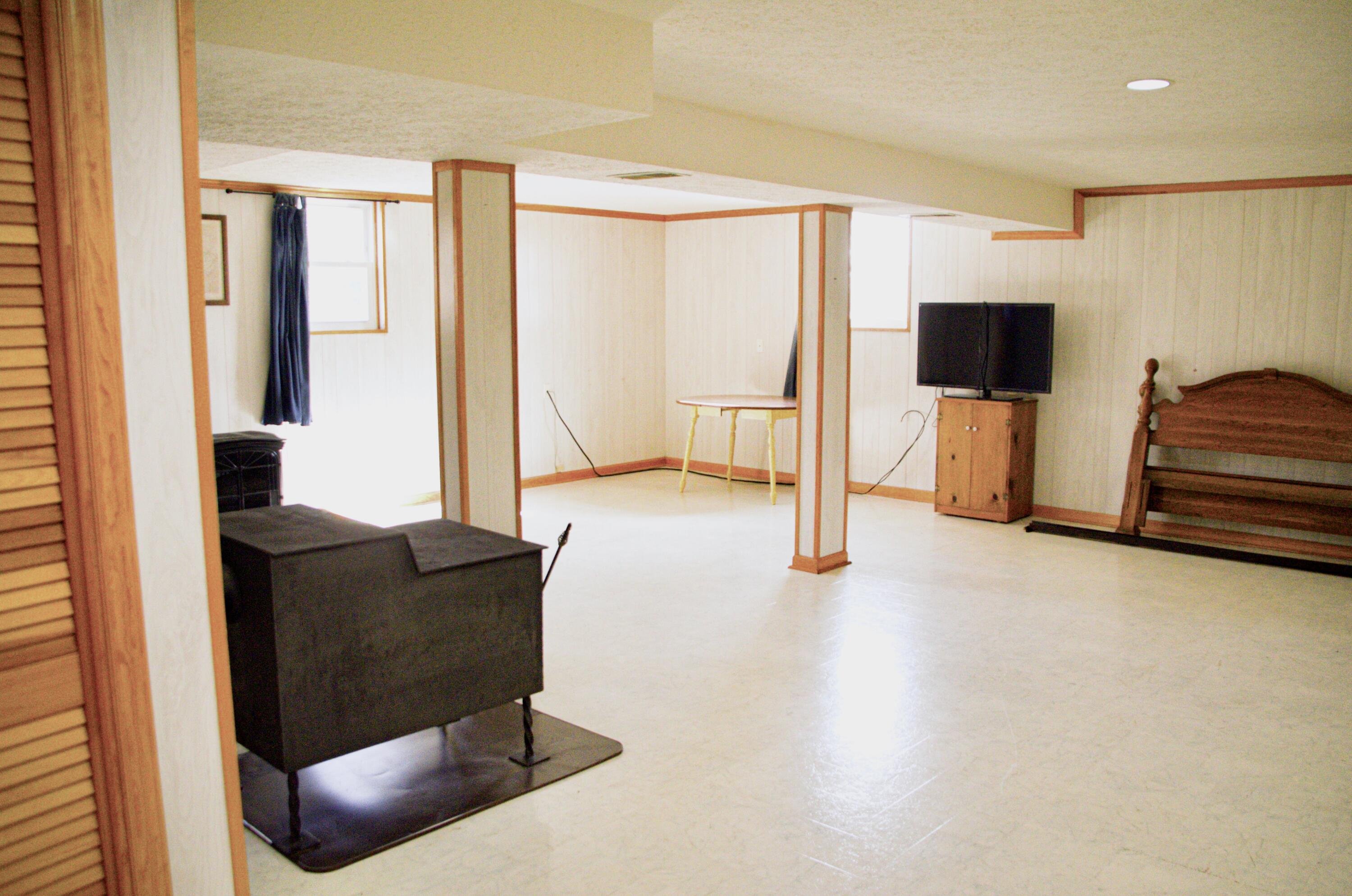 420 Emery Road Chatham, VA 24531 - Photo 13 of 18 a living room with furniture and a flat screen tv