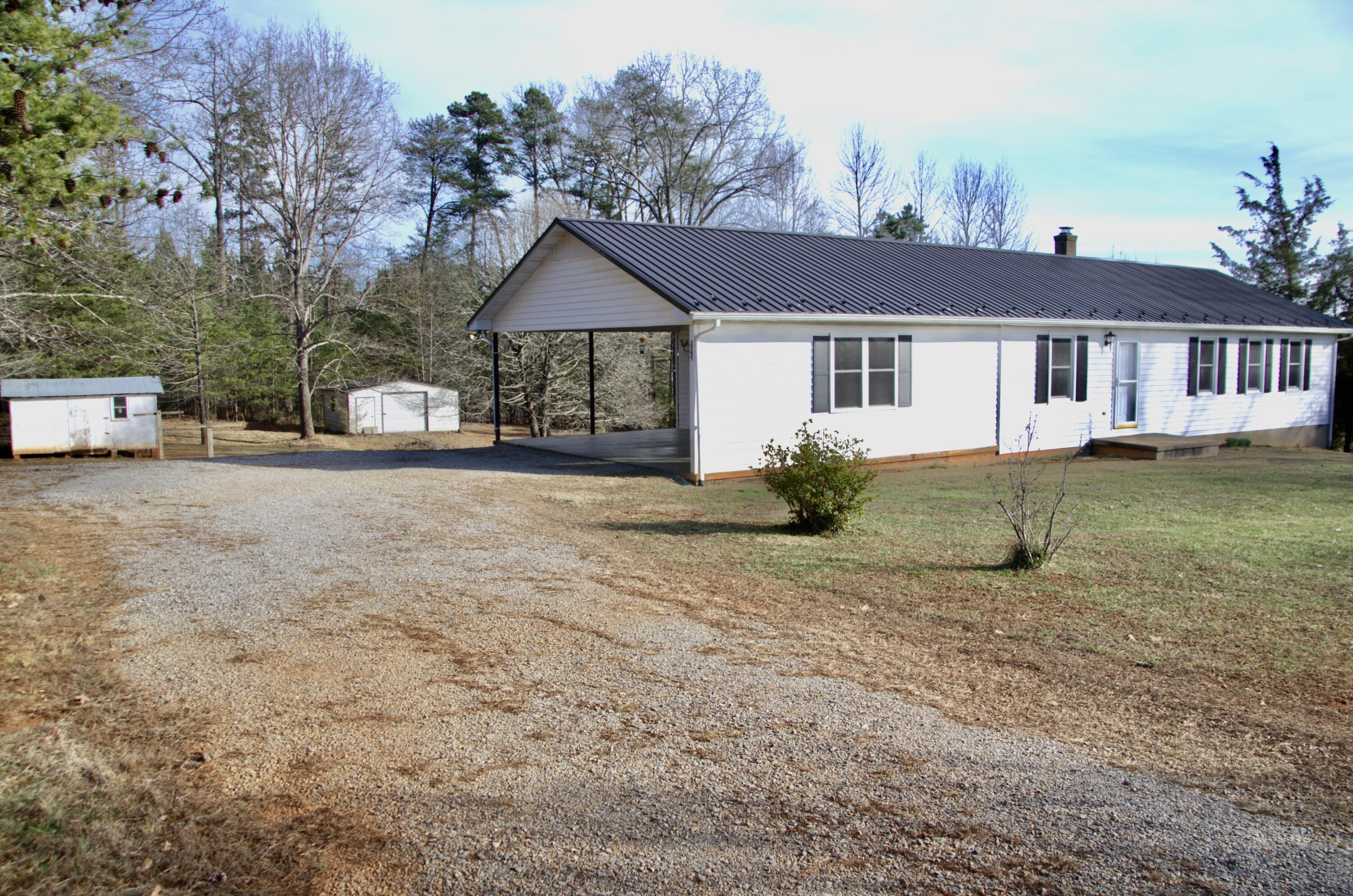 420 Emery Road Chatham, VA 24531 - Photo 16 of 18 front view of a house with a yard