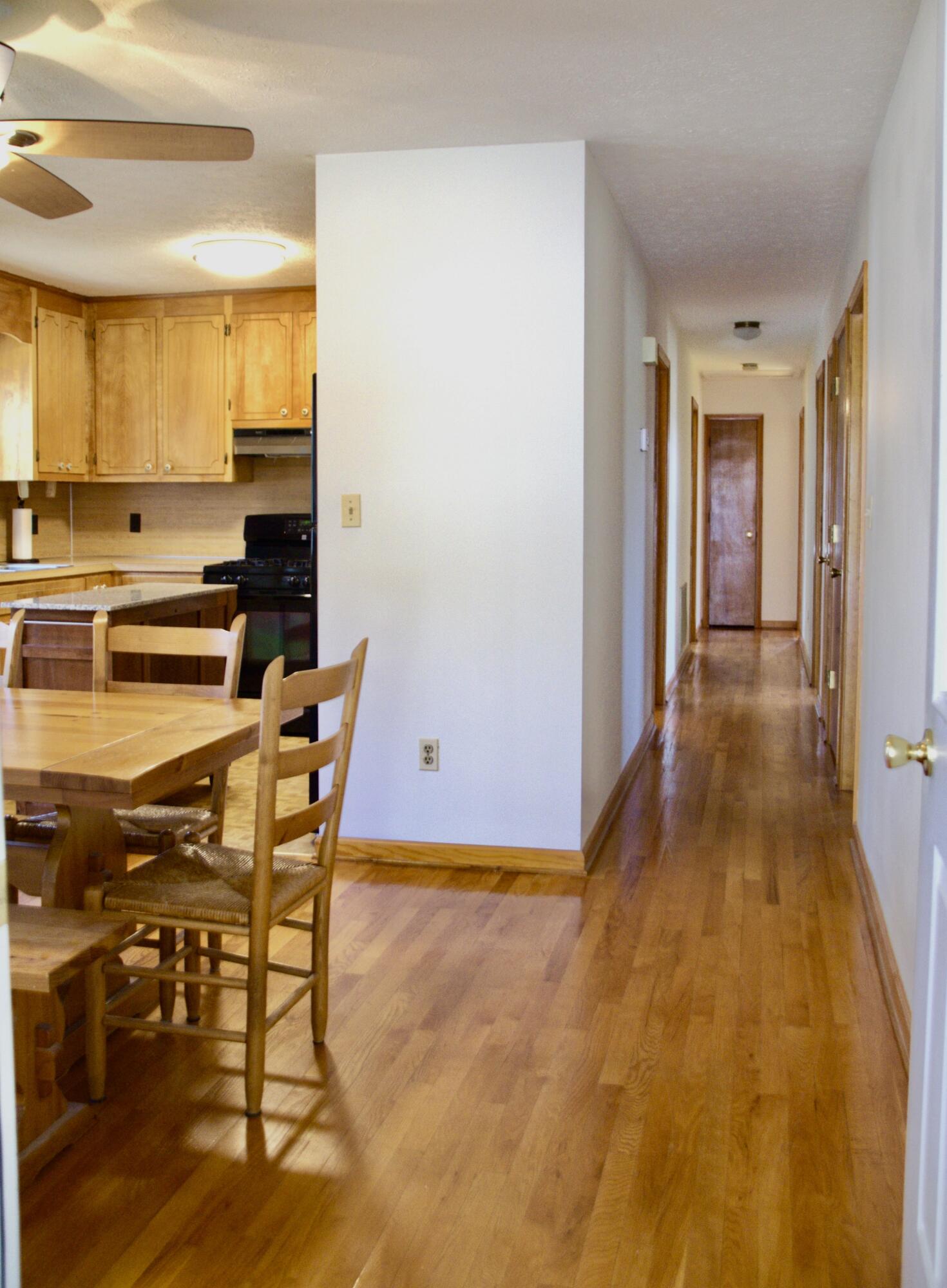 420 Emery Road Chatham, VA 24531 - Photo 6 of 18 a view of a kitchen with kitchen island and stainless steel appliances