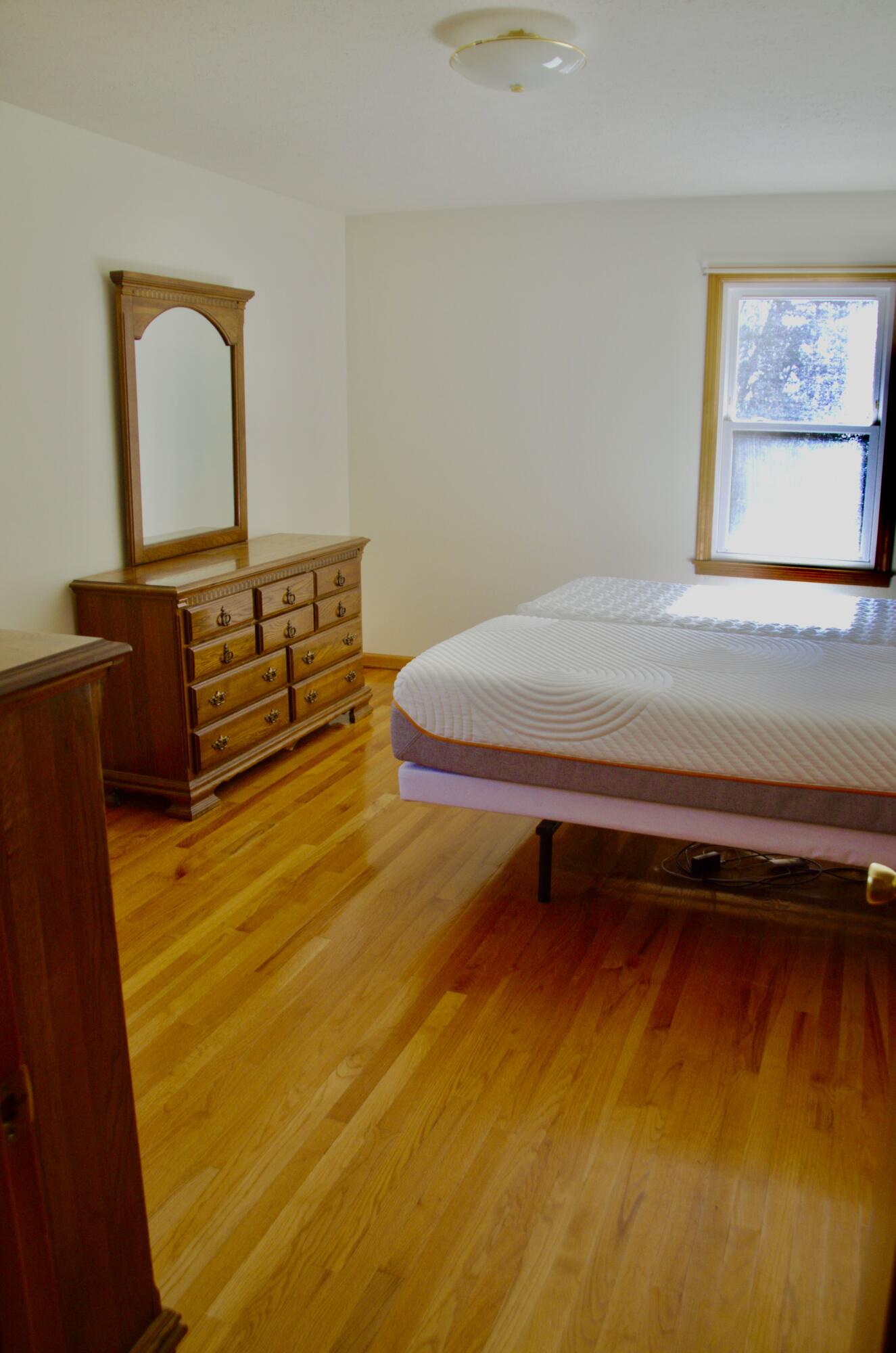 420 Emery Road Chatham, VA 24531 - Photo 7 of 18 a room with wooden floor pool table and window