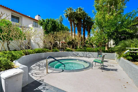 a view of swimming pool with a garden