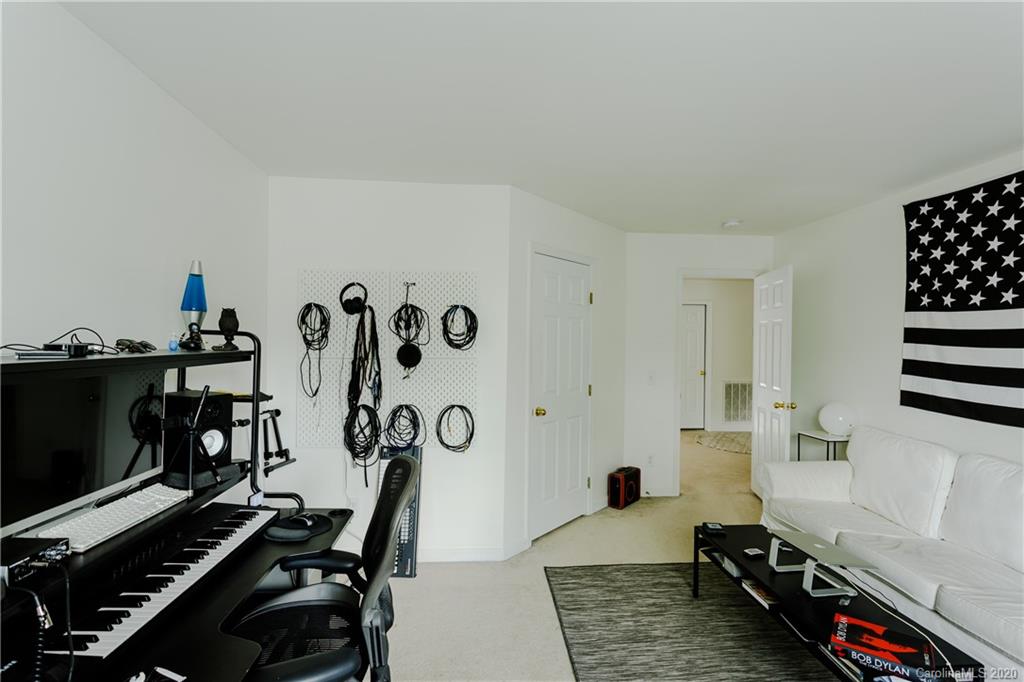 162 Snead Road Fort Mill, SC 29715 - Photo 15 of 25 a room with gym equipment and a window