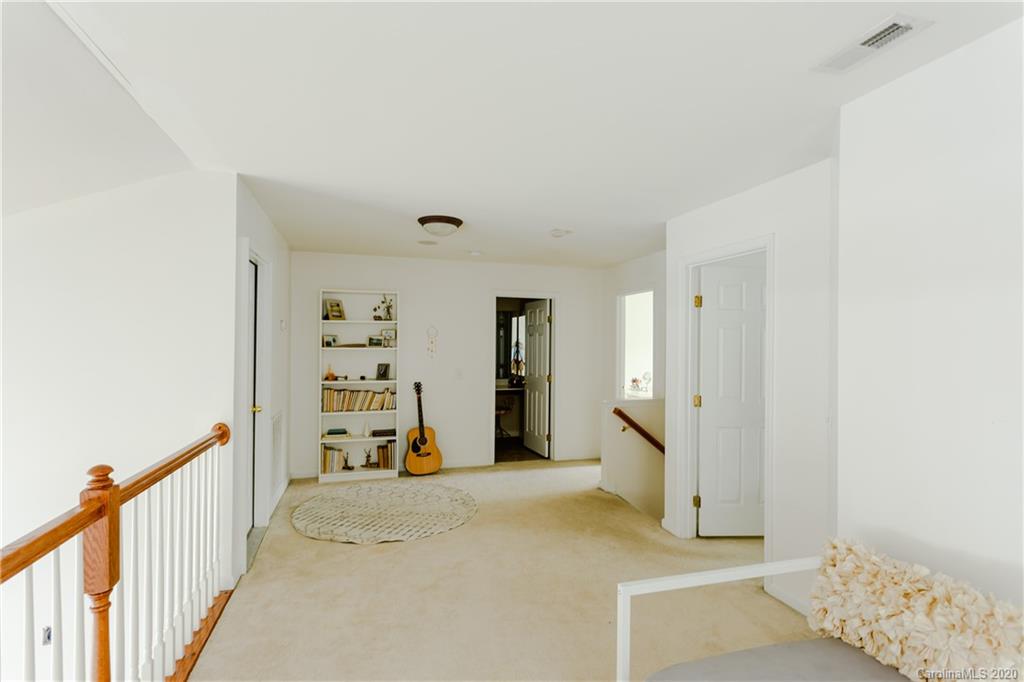 162 Snead Road Fort Mill, SC 29715 - Photo 16 of 25 a view of a livingroom with wooden floor and furniture
