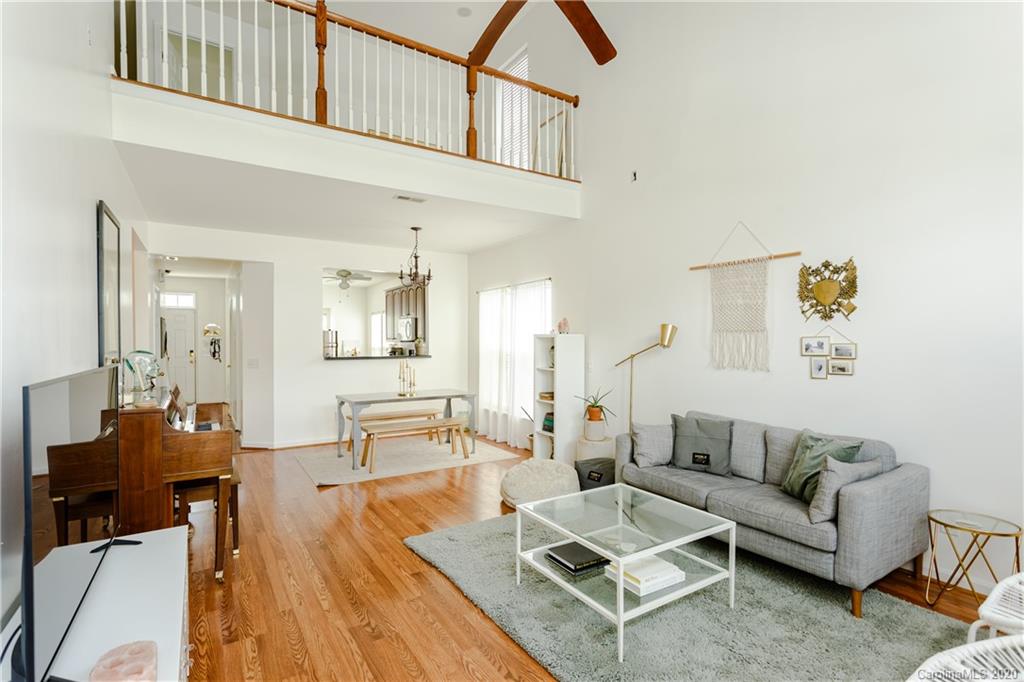 162 Snead Road Fort Mill, SC 29715 - Photo 9 of 25 a living room with furniture and wooden floor