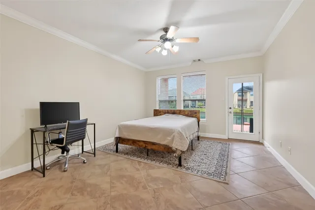 a spacious bedroom with a bed and a table