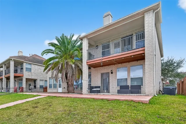front view of a building with a yard