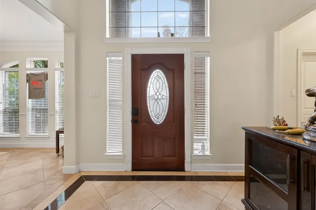 a front view of a house with entrance gate