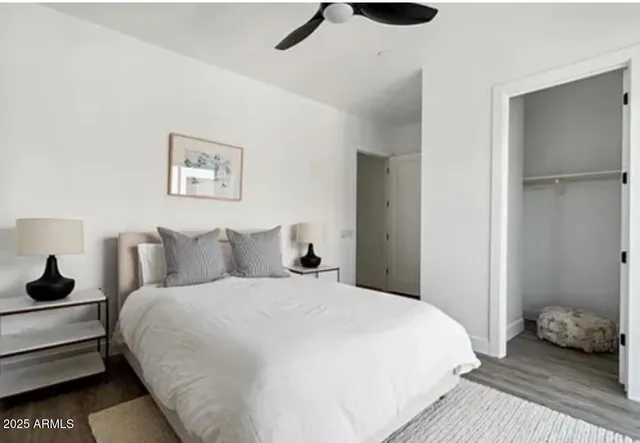 a bedroom with a bed and a view of bathroom