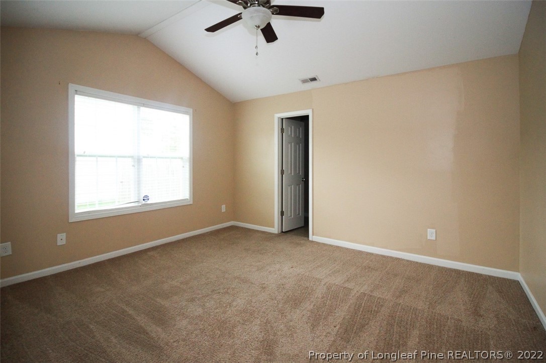 6377 Overhills Road Spring Lake, NC 28390 - Photo 16 of 29 an empty room with a window