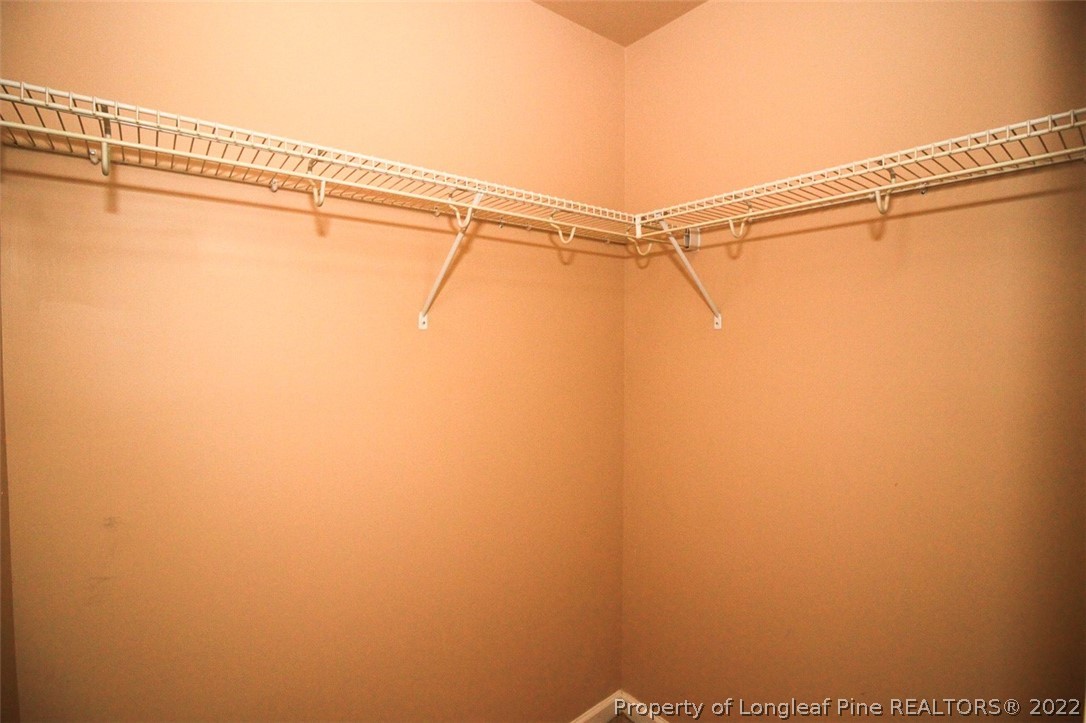 6377 Overhills Road Spring Lake, NC 28390 - Photo 21 of 29 a view of a room with racks on the wall