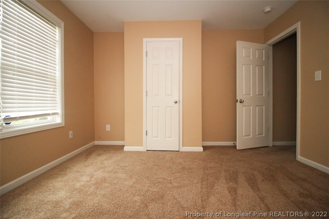 6377 Overhills Road Spring Lake, NC 28390 - Photo 23 of 29 an empty room with window